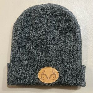 Gray Knit Beanie with Logo Patch. New without tag.